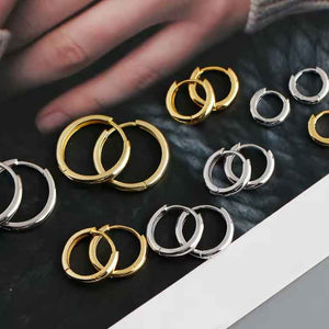 silver hoop huggie earrings gold