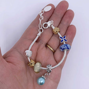 silver charm bracelet blue pearl