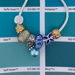 silver charm bracelet blue pearl