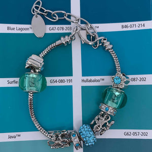 silver charm bracelet green beads resene