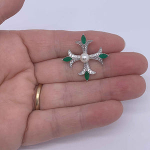 cross shaped brooch green crystals