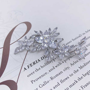 brooch silver spray flowers on book