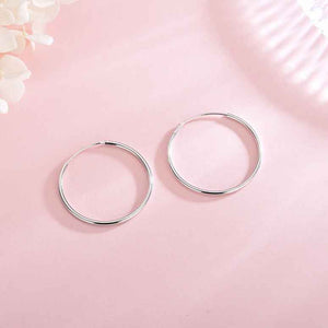 Silver hoop earrings pink