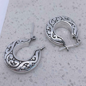 silver koru hoop earrings jewellery