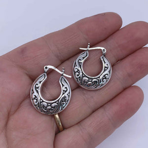 silver koru hoop earrings frenelle