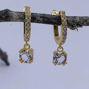 gold huggie earrings crystal online