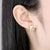 gold cz diamond flower stud earrings