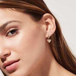 gold huggie heart earrings