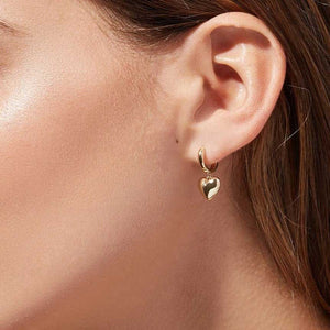 gold huggie heart earrings
