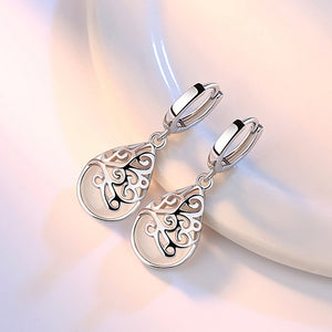 huggie silver pear drop earring for women