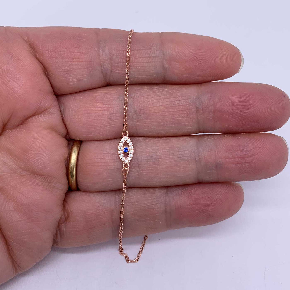 rose gold evil eye bracelet frenelle