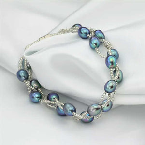 Silver Bracelet with Pearls on three strands "Luguana" (Peacock)