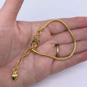 yellow gold charm bracelet frenelle