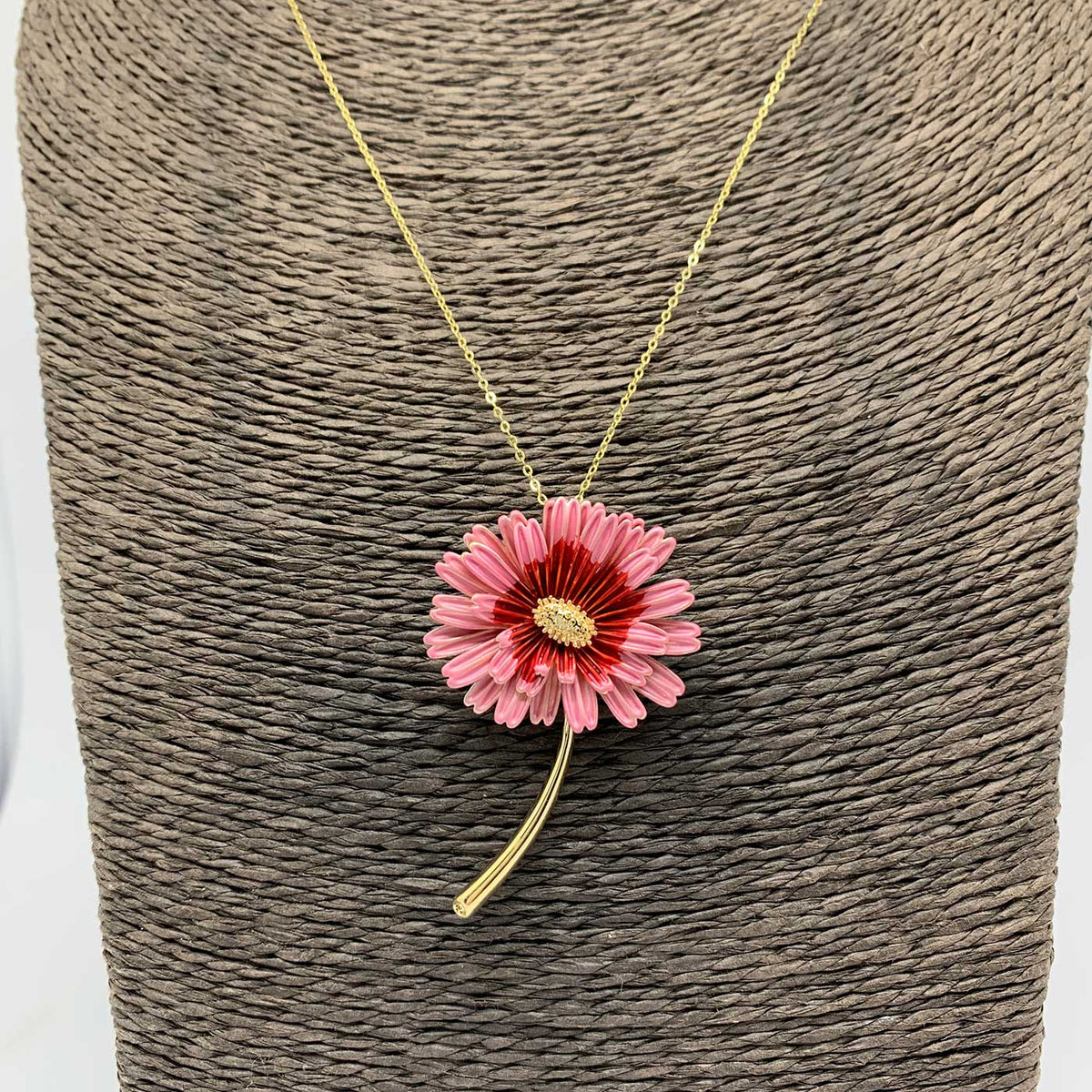 pink gerbra flower brooch on gold chain