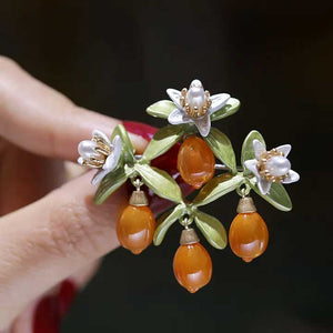 orange blossom brooch jewellery