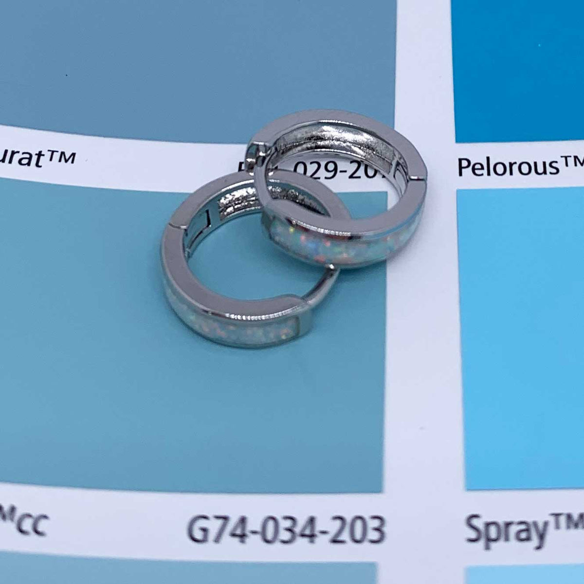 silver opal huggie earring resene