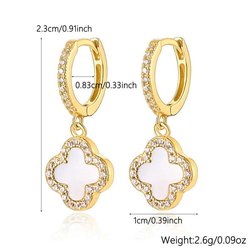 gold white huggie earrings