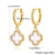 gold white huggie earrings