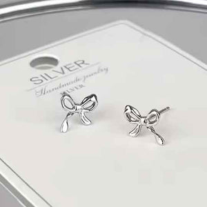 silver bow earrings studs