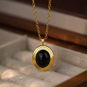 Gold black onyx necklace pendant