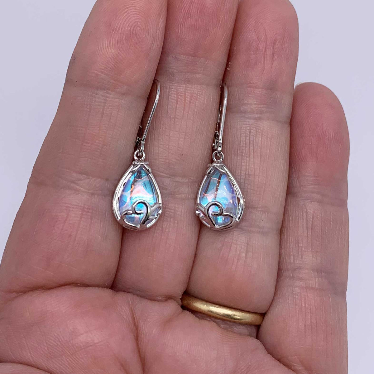 silver moonstone drop earrings hand