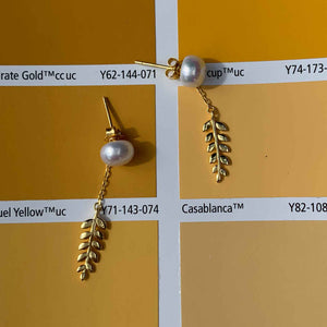 Gold Stud Pearl Earrings with hanging leaf "Nirilla"