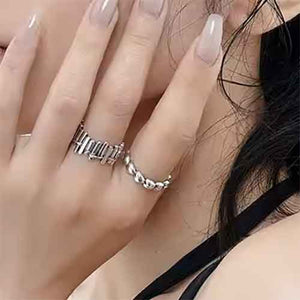 silver heart ring finger