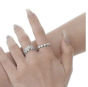 silver heart ring hand