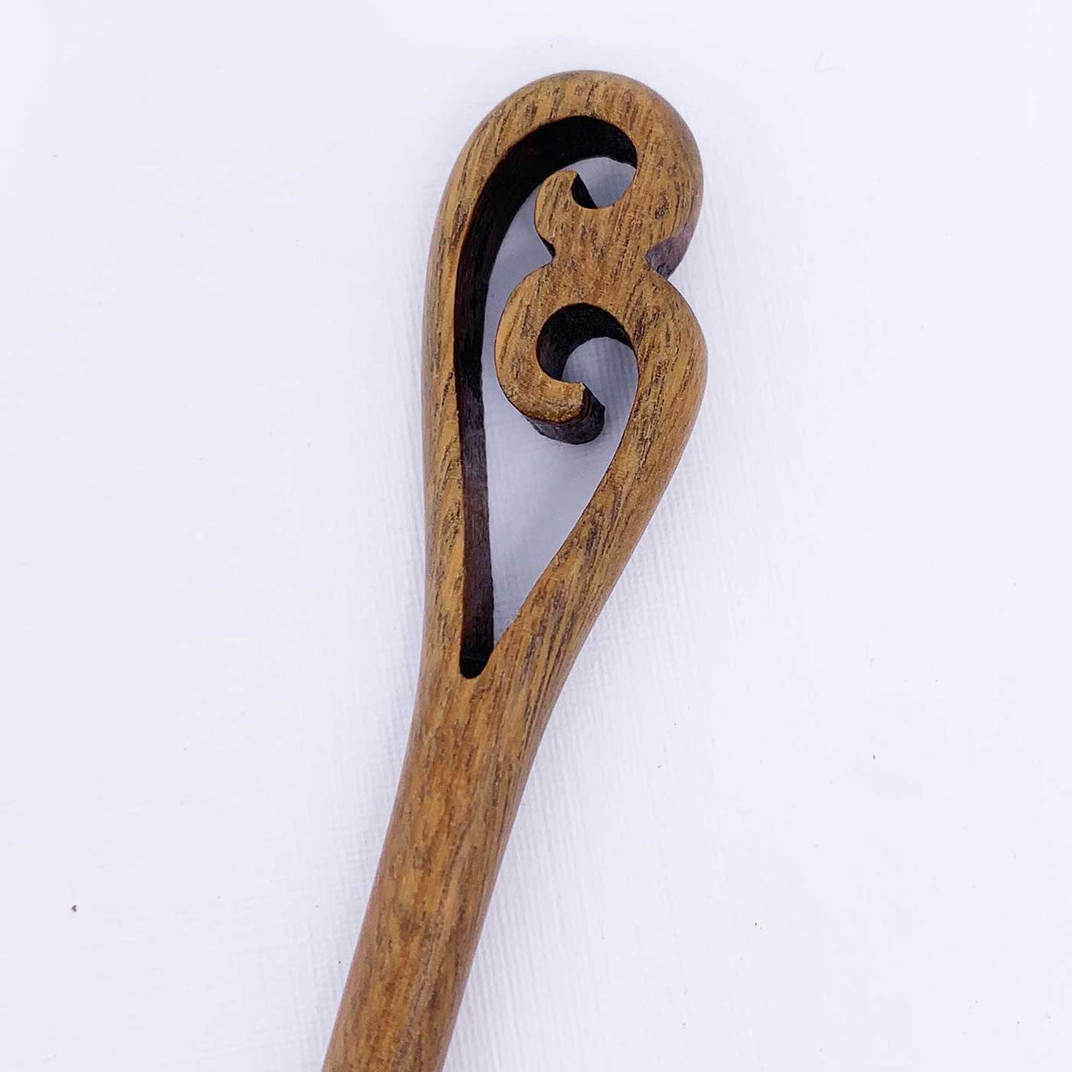 koru maori hair stick close up