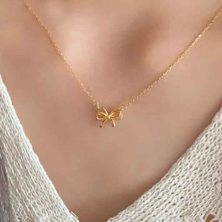 gold bow necklace frenelle