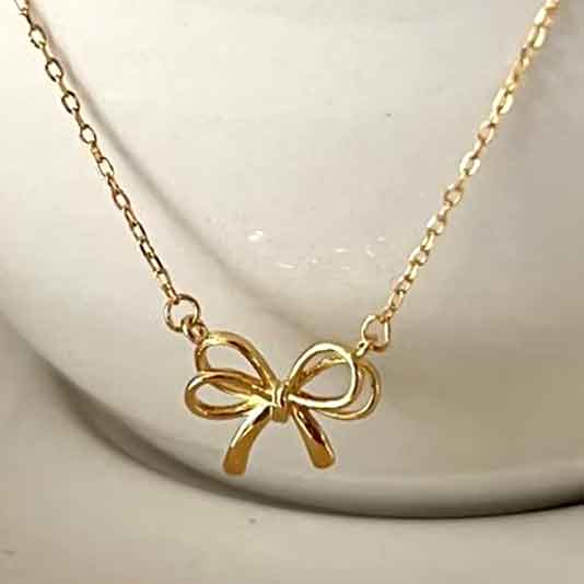 gold bow necklace jewellery