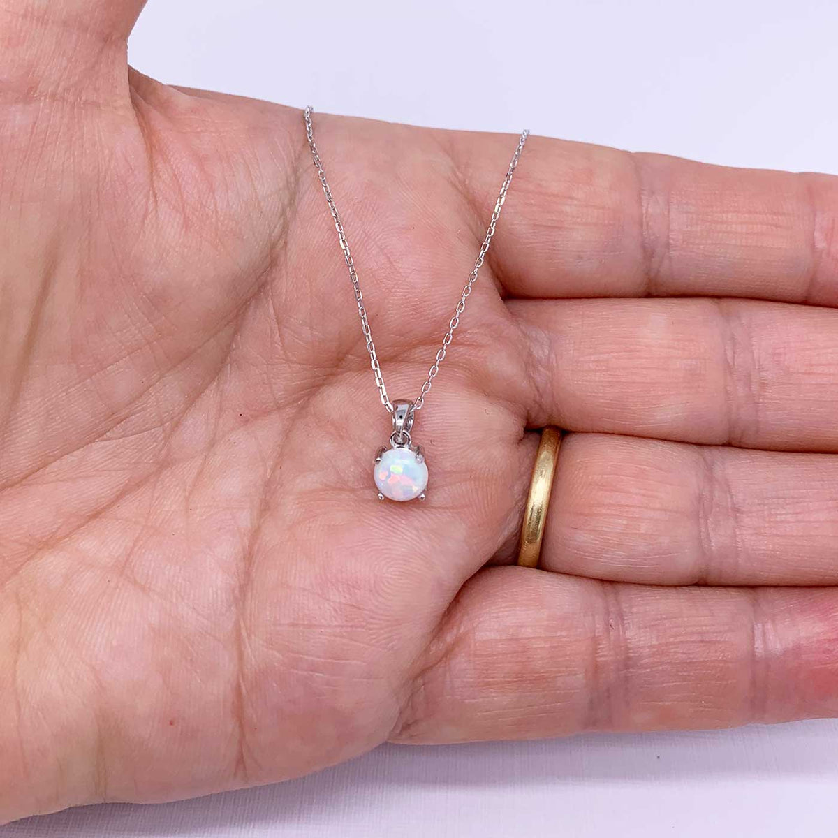 silver white opal necklace hand