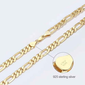 gold figaro chain silver base