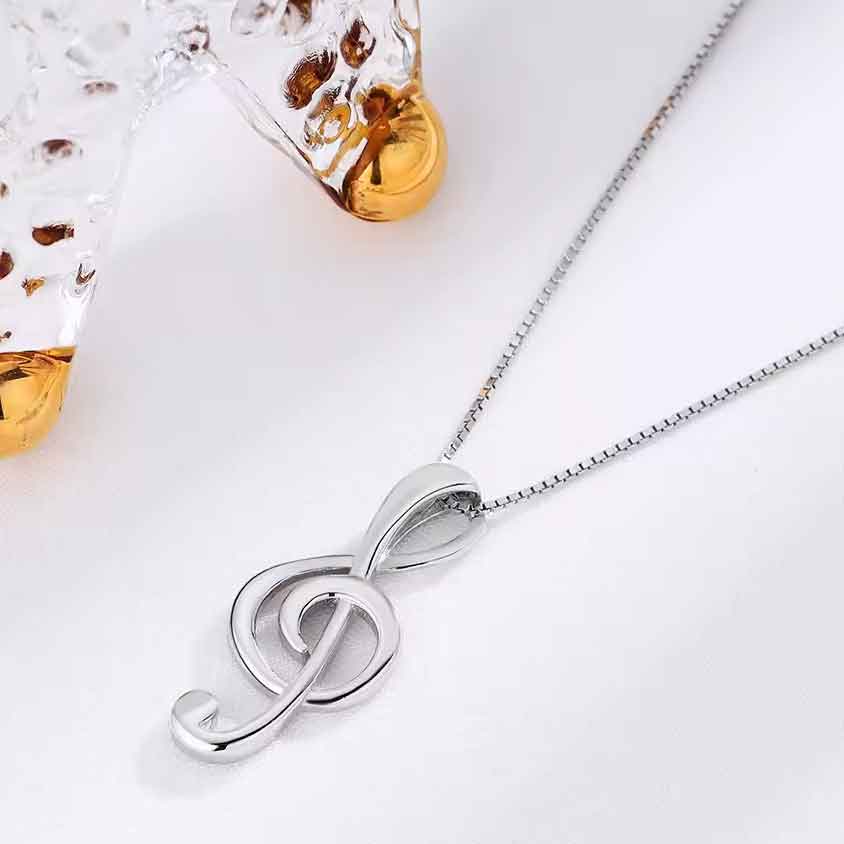 silver treble clef pendant necklace