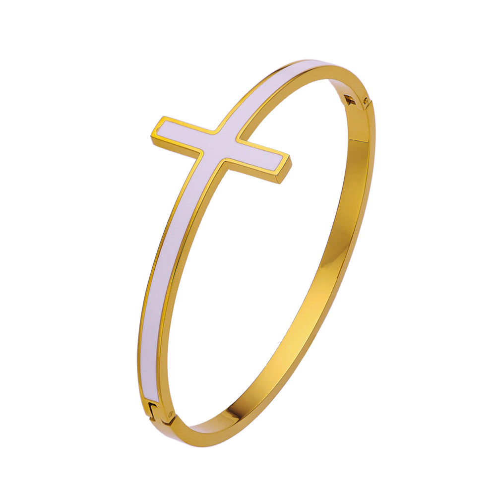 gold cross bracelet for sale online from frenelle jewellery auckland nz