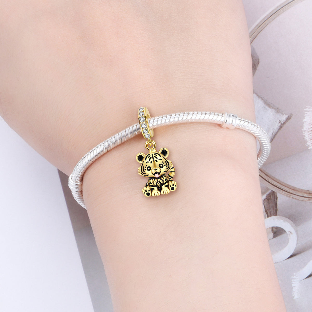 Gold tiger cub charm frenelle jewellery