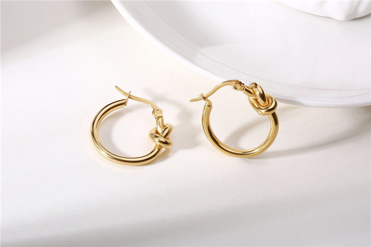 gold knotted hoop earrings frenelle jewellery