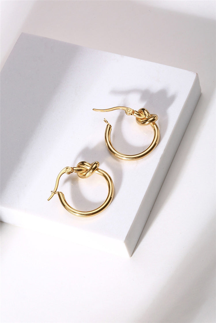 gold knotted hoop earrings frenelle jewellery