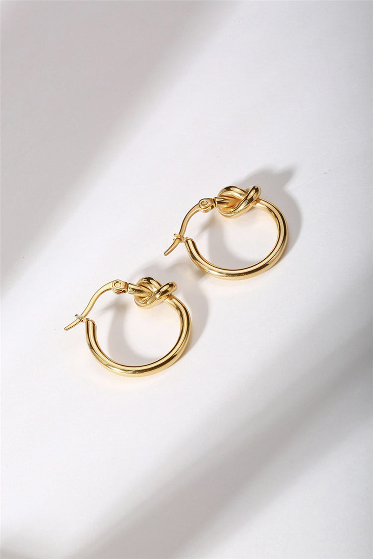 gold knotted hoop earrings frenelle jewellery