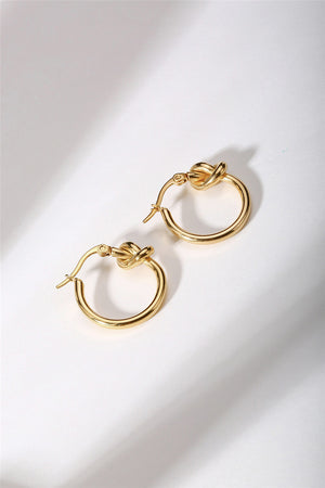 gold knotted hoop earrings frenelle jewellery