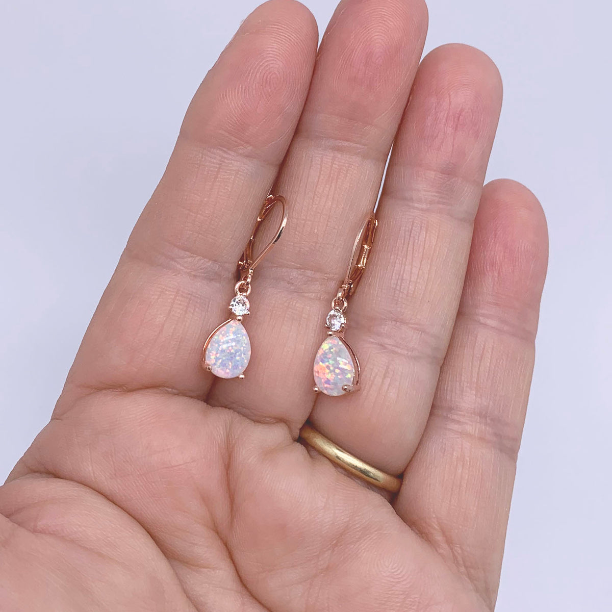rose gold opal leverback earrings frenelle jewellery