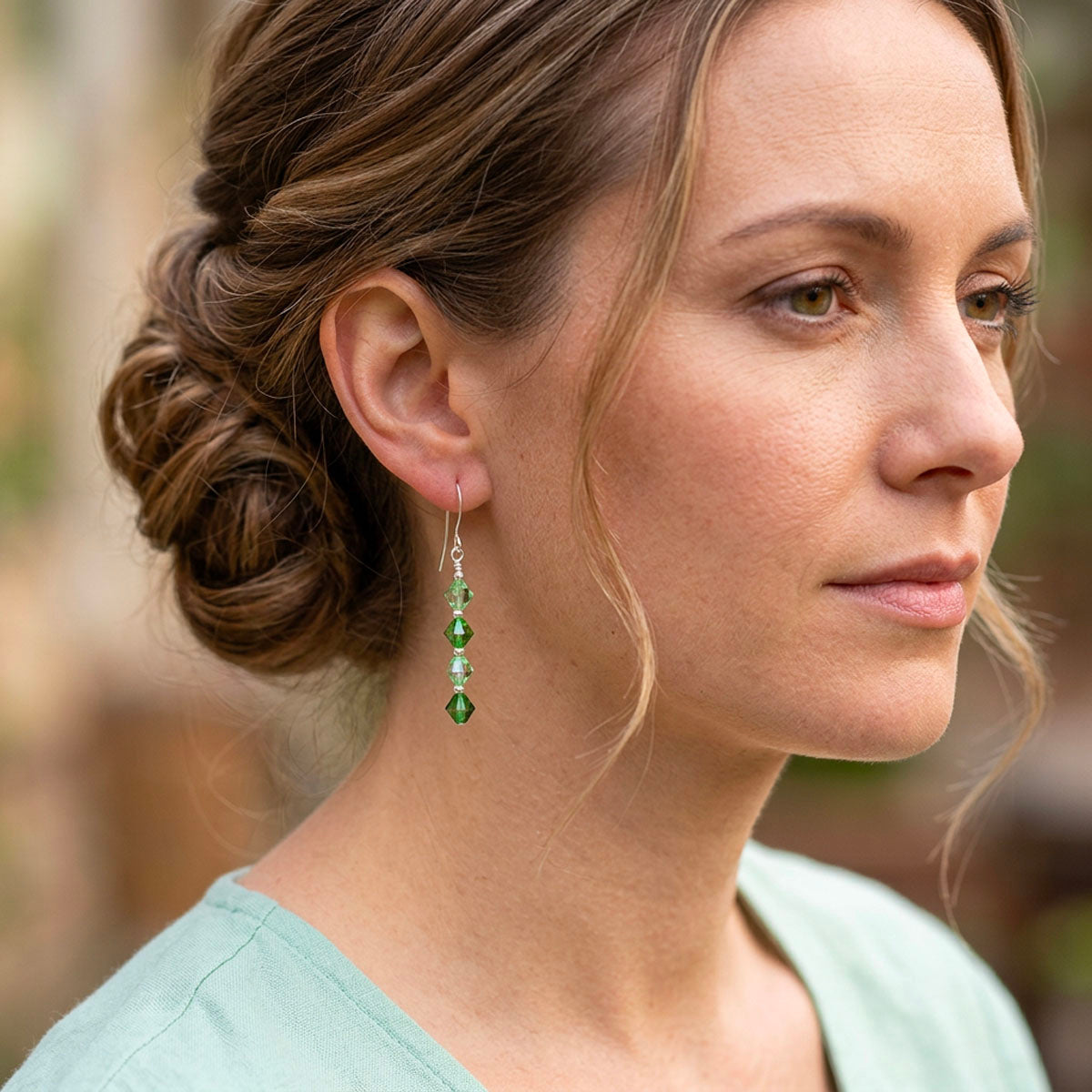 silver green earrings made with swarovski crystals frenelle jewellery