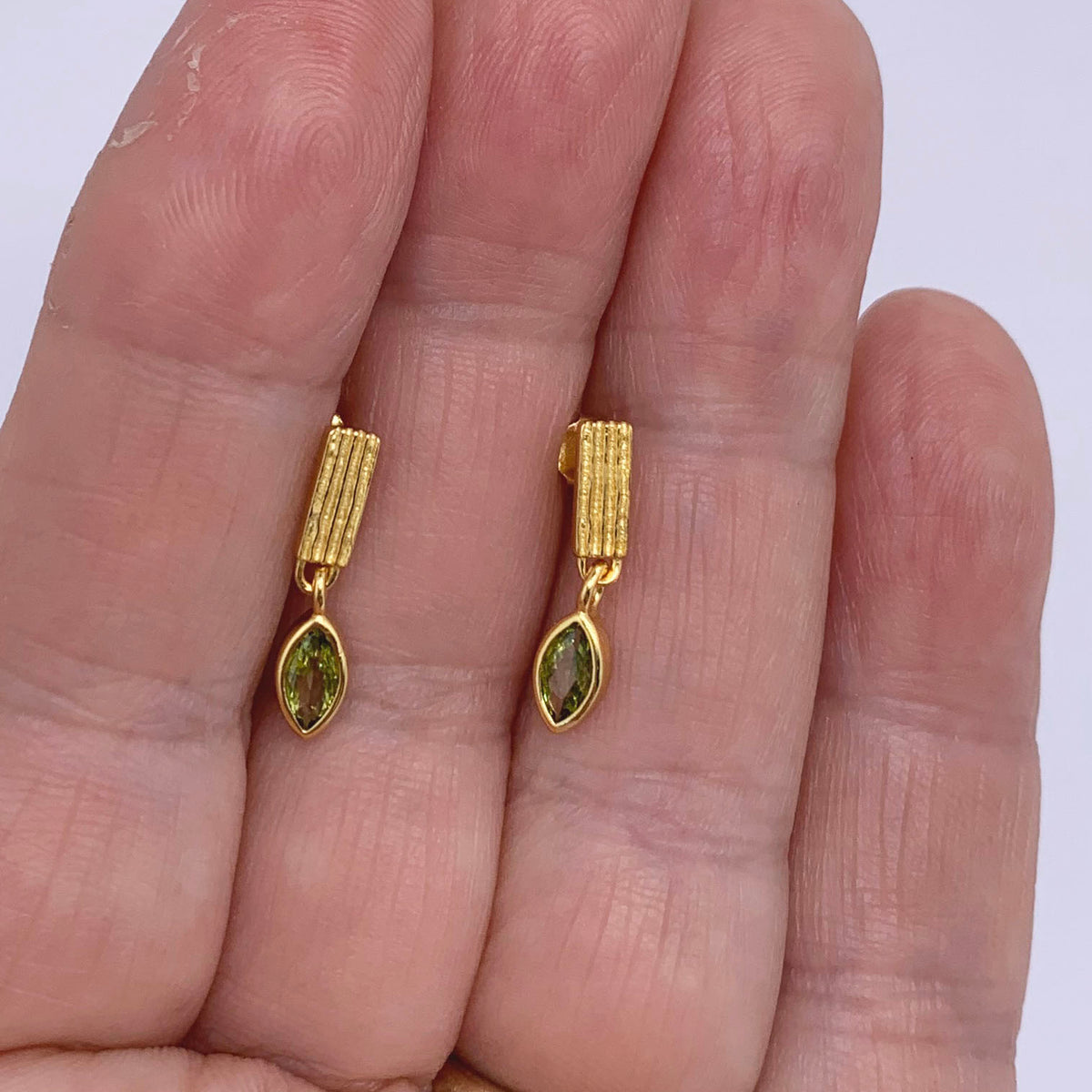 gold drop green crystal earrings frenelle jewellery