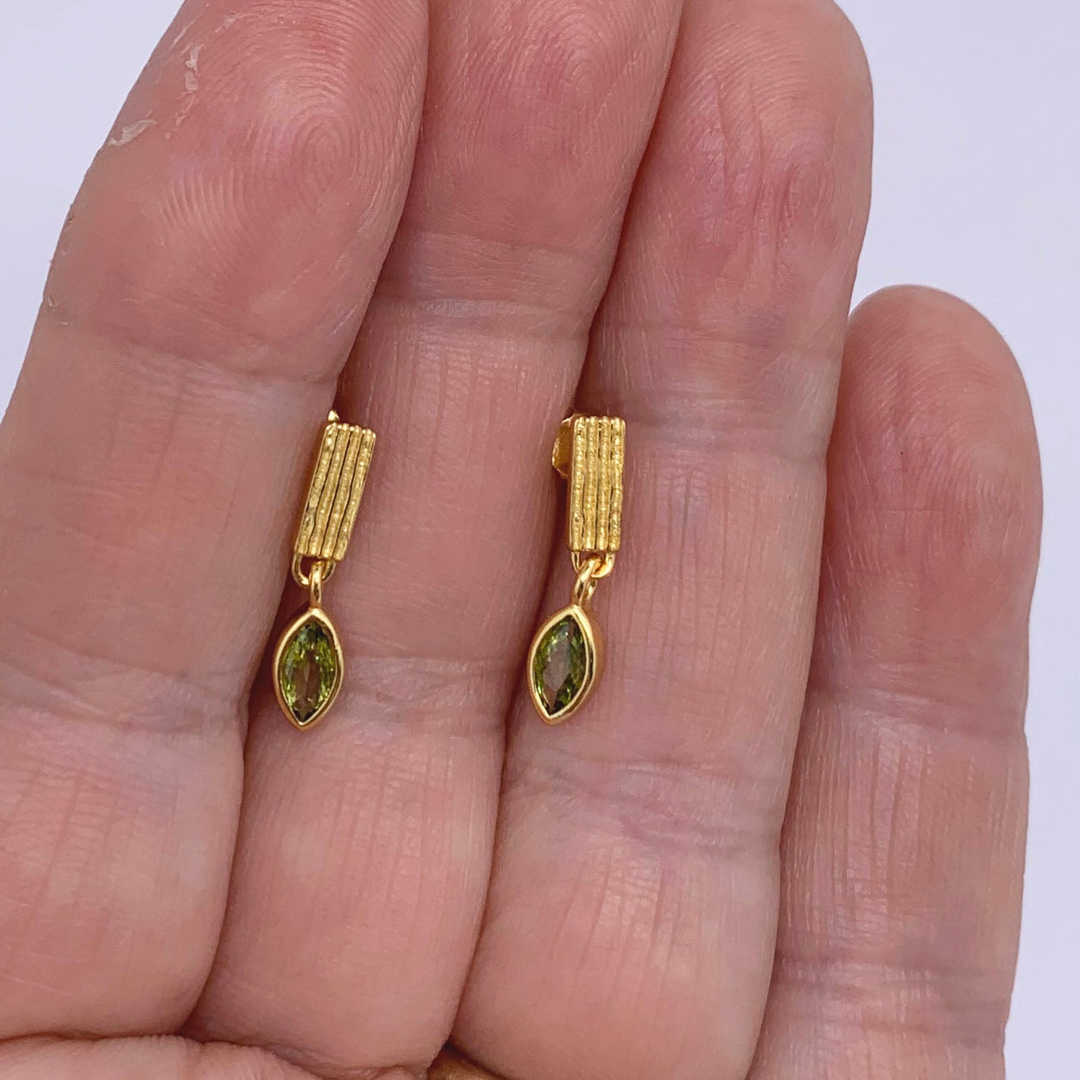 gold drop green crystal earrings frenelle jewellery