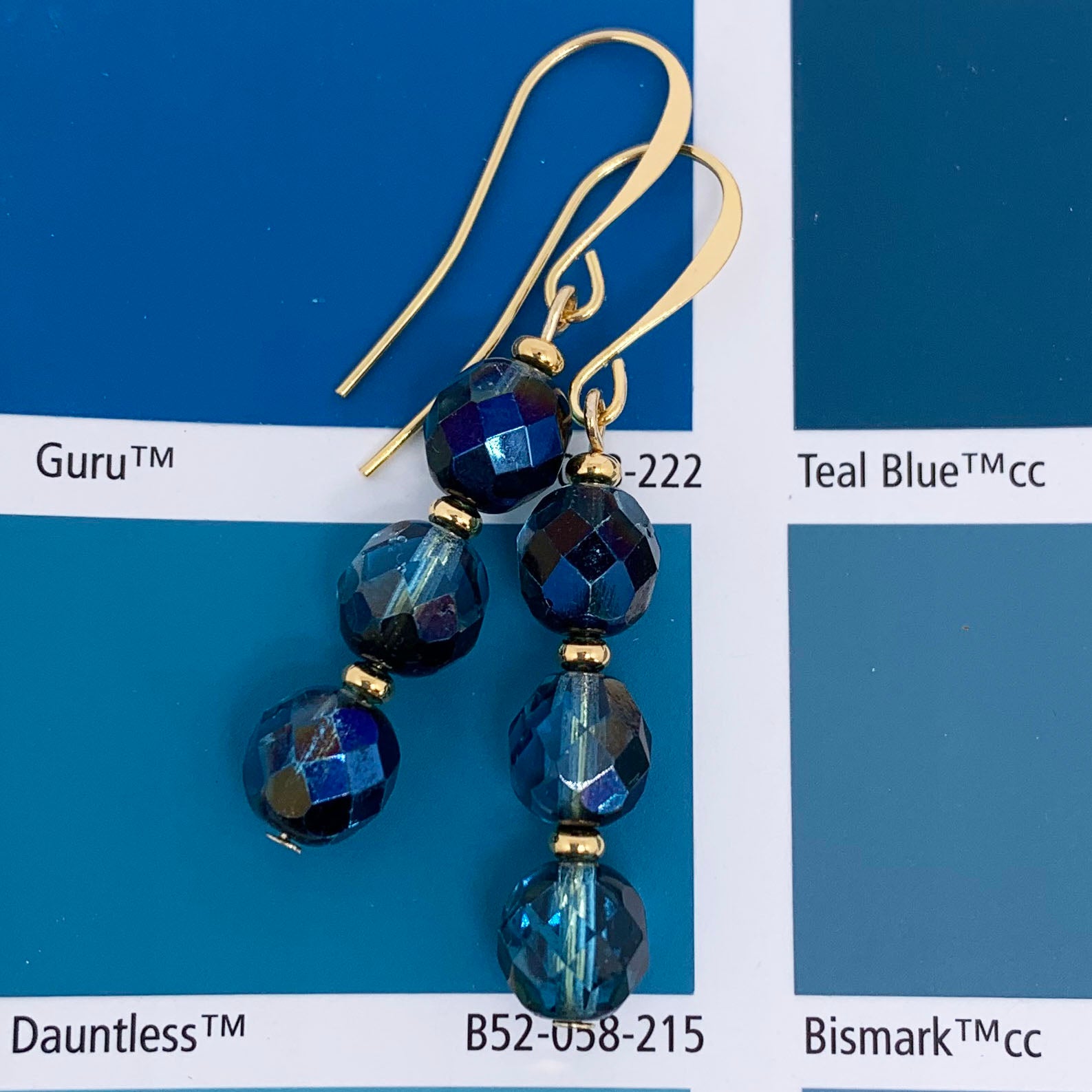 teal blue drop earrings with gold fittings frenelle jewellery