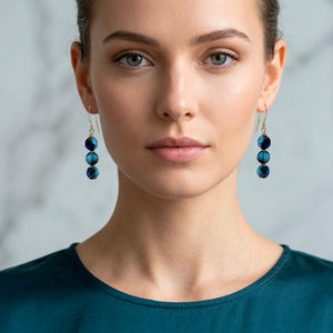 teal blue drop earrings with gold fittings frenelle jewellery