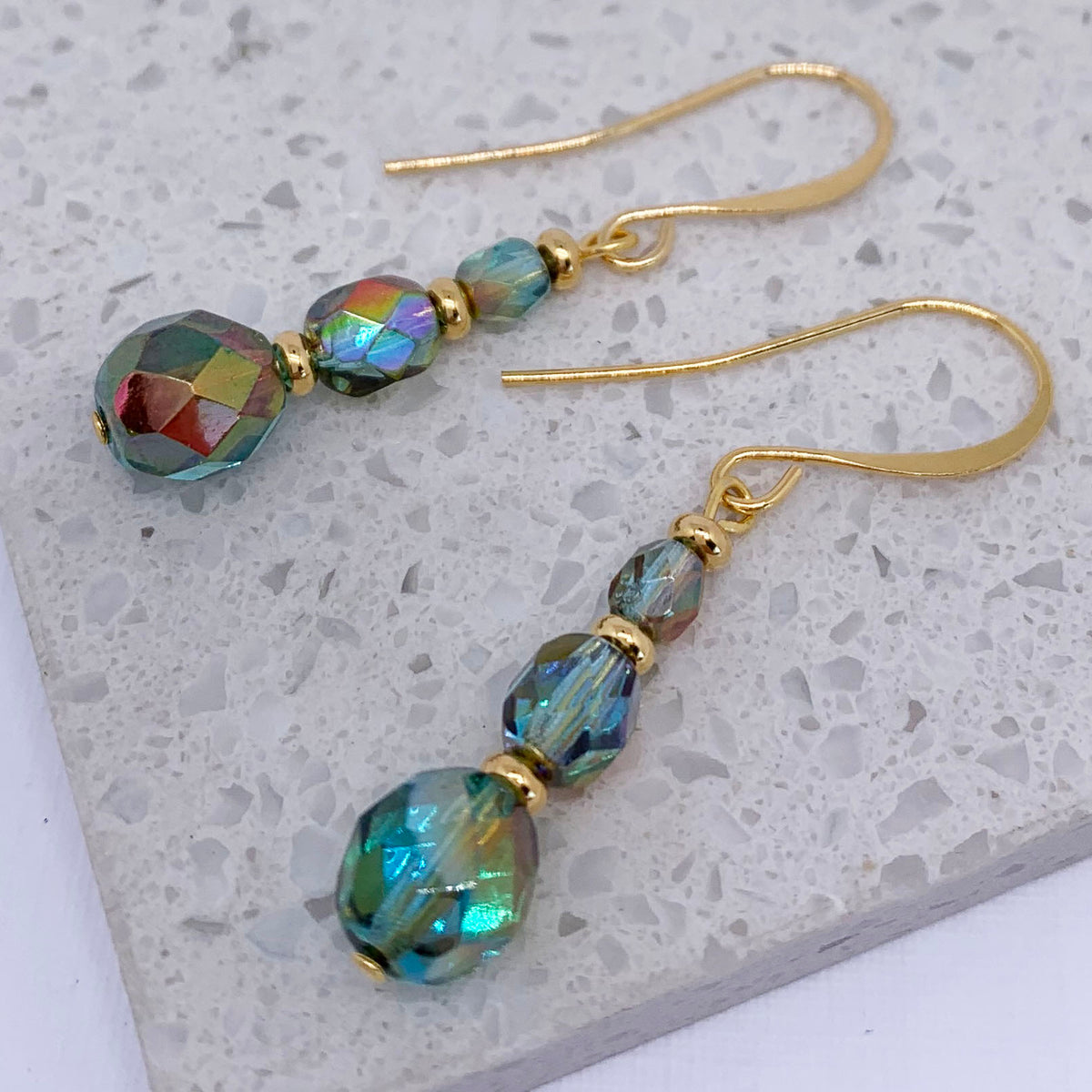 gold paua drop earrings frenelle jewellery