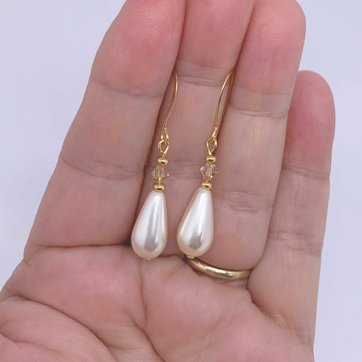 gold pearl earrings with swarovski crystals frenelle jewellery