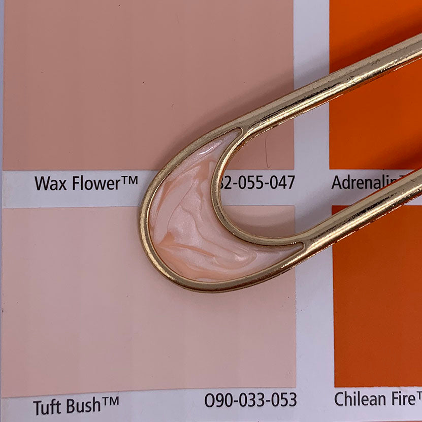 gold fork hair accessory on resene chart