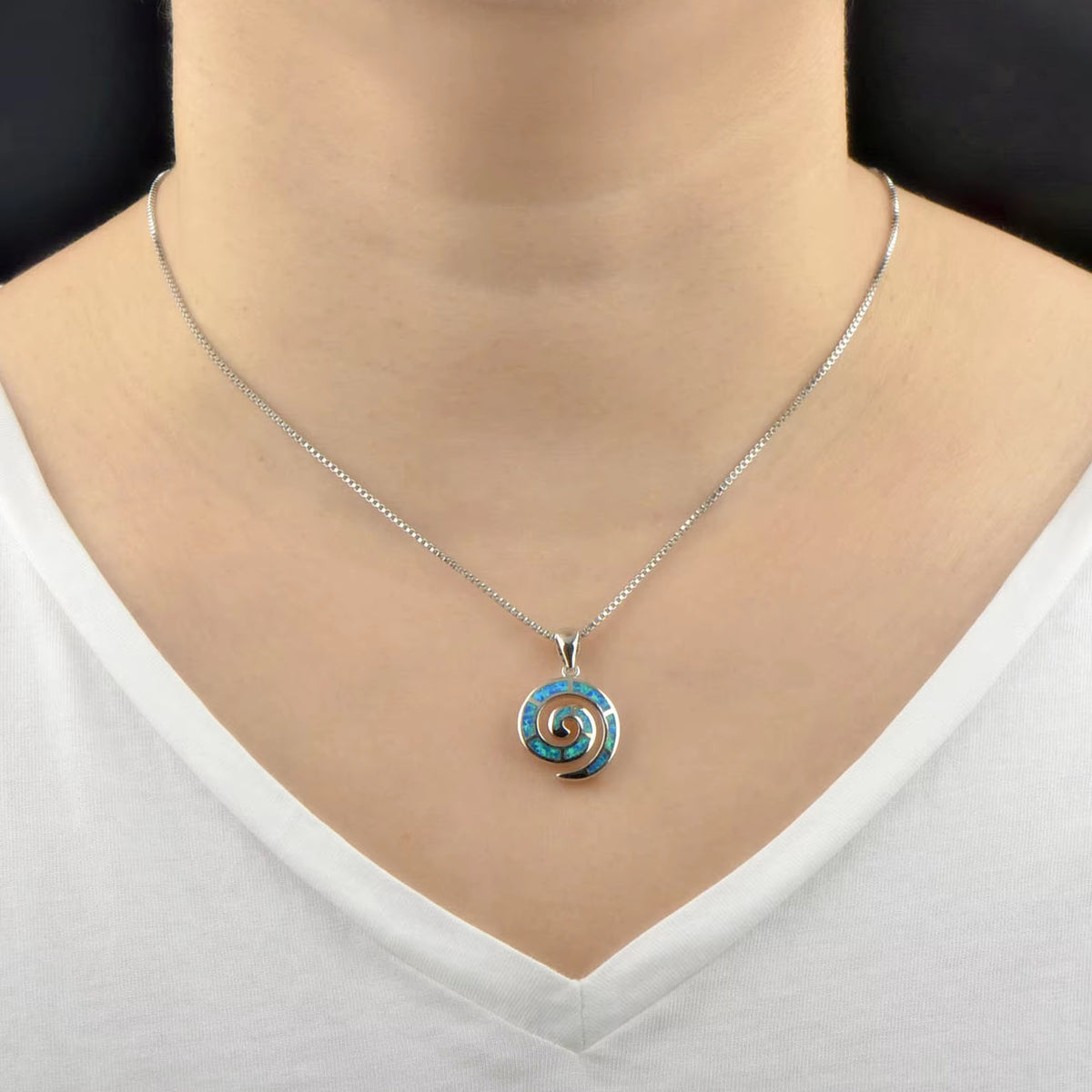 silver koru NZ necklace with opal
